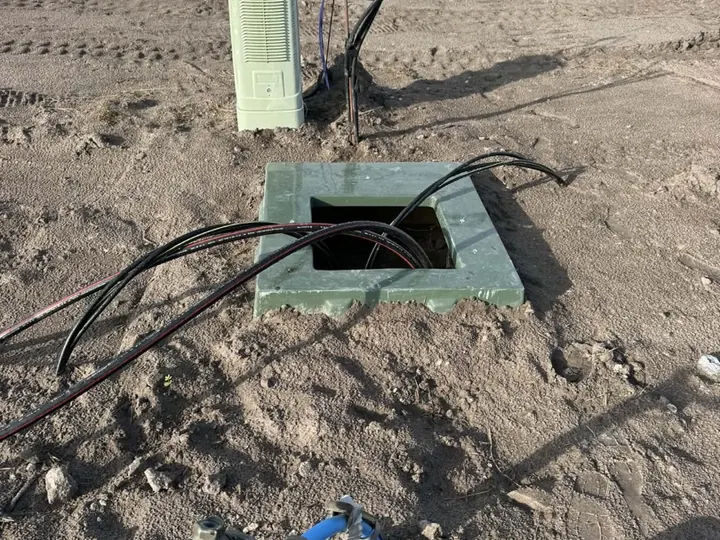 Long open trench through a large site